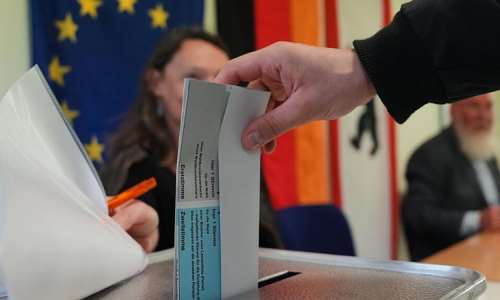 A man casts his vote at a polling station during the Berlin state election in Berlin, Germany, Sunday, Sept. 20, 2026. -  Markus Schreiber, AP