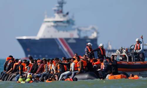 A group of people try to cross the Channel from France to Britain on a dinghy boat, in Hardelot, northern France, Wednesday, September 23, 2026. -  Jean-Franois Badias, AP
