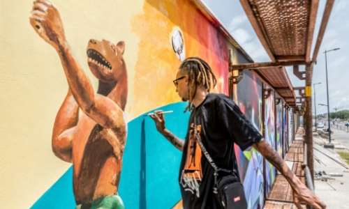 Beninese and international graffiti artists are hoping the mural will become the world's largest. By YANICK FOLLY AFP