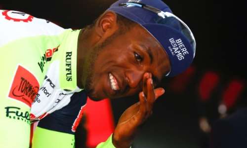 History-maker Biniam Girmay pulled out of the Giro d'Italia before the start of the 11th stage, with an eye injury he suffered when he was struck by a Prosecco cork.. By Luca Bettini AFP