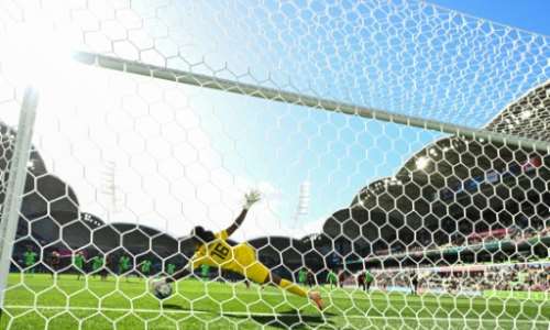 Nigeria's goalkeeper Chiamaka Nnadozie saves a penalty from Canada's Christine Sinclair. By WILLIAM WEST AFP
