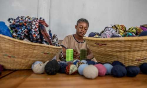 Out of piles of fabric all manner of objects take shape -- from placemats and rugs to earrings. By Yanick Folly (AFP)