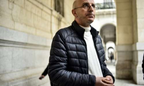 Said Djabelkhir, a renowned Algerian scholar on Islam, outside the Sidi M’hamed courthouse in Algeria's capital Algiers last month. By RYAD KRAMDI (AFP)