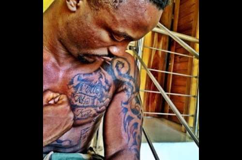 Iyanya Mourns Parents, Brother With Tattoos