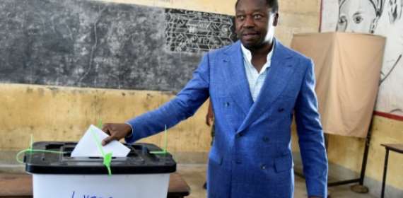 Togo leader Gnassingbe follows father's political playbook