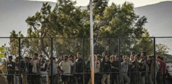 Greece freezes asylum claims over migrant invasion from Lib