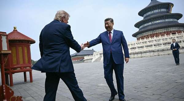 Chinese President Xi Jinping shakes hands with US President Donald Trump at the Temple of Heaven in Beijing on 14 May 2026. - AFP - BRENDAN SMIALOWSKI