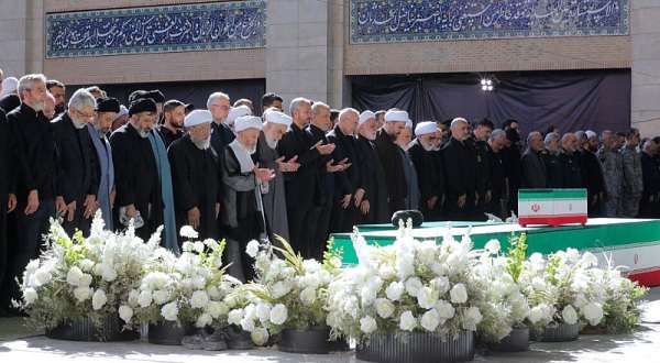 Iranian President Masoud Pezeshkian and Irans Parliament speaker Mohammad Baqer Qalibaf with officials attend a prayer during a public farewell ceremony to pay their respects to late Supreme Leader Ayatollah Ali Khamenei at the Imam Khomeini Grand Mosalla, in Tehran, Iran July 5, 2026. -  Reuters