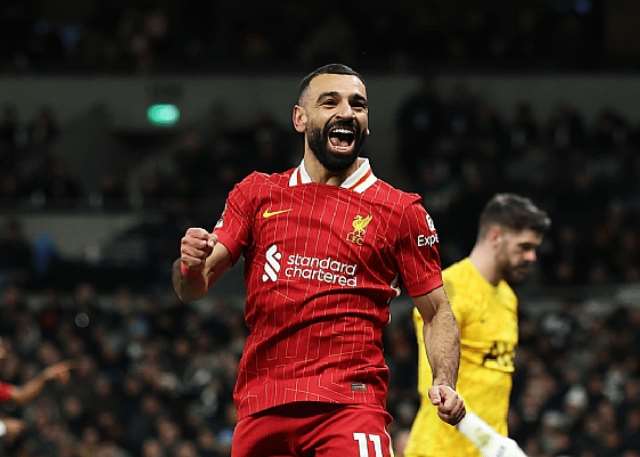 Liverpool put six past Spurs to go four points clear