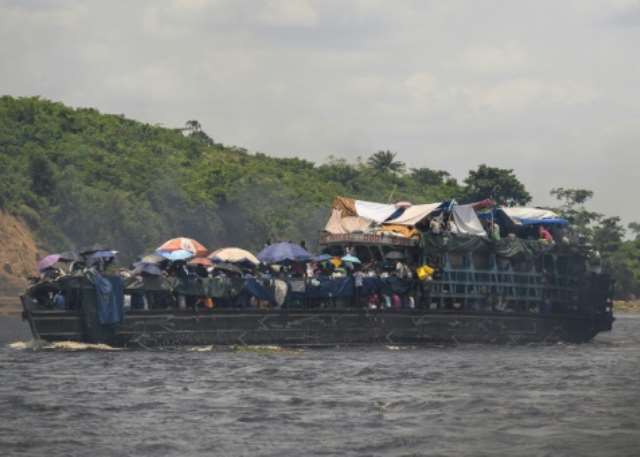 「THE MIRACLE AT KINSHASA」 Up the Congo River on an eventful voyage aboard 'God's Miracle'