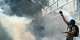 Swiss police fire tear gas as anti-G7 protesters target UN buildings
