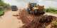 Kpone-KatamansoMunicipal Assembly clearsmedianof weedsto improve road safety