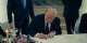 We cleared the plates: Versailles dinner becomes stage for Trumps surprise signature of Iran deal