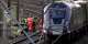 One dead and dozens injured in train collision north of London