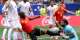 Ten-man Belgium held by Iran for second World Cup draw