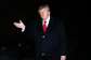 President Donald Trump waves while returning to the White House following a domestic trip in October. -  Nathan Howard, AP