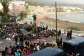 Police escort migrants from Benitez Beach to be relocated to the camp set up at the port of Ceuta, Spain, 18 September 2026. -  REUTERS
