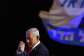 Israels Prime Minister Benjamin Netanyahu gestures to his supporters at the election night rally after the first exit polls were announced, in Jerusalem. -  Jalaa MAREY / AFP