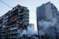 Rescue workers clear the rubble of a house heavily damaged after a Russian strike on a residential neighborhood in Kyiv, Ukraine, on May 14, 2026. -  Evgeniy Maloletka, AP