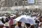 Muslim worshippers walk along the Grand Mosque complex under the water-mist fans installed in the holy city of Mecca on May 24, 2026, ahead of the annual Hajj pilgrimage. -  Zain Jaafar, AFP