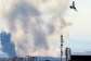 Smoke rises following strikes on Tehran on April 7, 2026 -  Atta Kenare, AFP