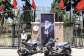 A man walks past a portrait of slain Iranian supreme leader Ayatollah Ali Khamenei near the former US embassy in Tehran on June 15, 2026. -  Atta Kenare, AFP