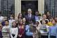 UK Prime Minister Keir Starmer surrounded by children