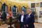 President Donald Trump in the Oval Office shortly after the US-Iran deal was announced -  Al Drago / POOL/AFP