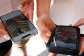 Young people use their phones to view social media in Sydney on November 8, 2024. -  Rick Rycroft, AP