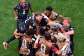 Canadas team embraces on the pitch after a World Cup win against South Africa on June 28, 2026. -  Frederic J. Brown, AFP