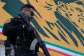 A police officer stands guard near a banner with  portraits of former Iranian leaders Ayatollah Khomeini and Ayatollah Ali Khamenei in Tehran, Iran on April 29, 2026. -  Vahid Salemi, AP