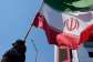 A woman holds an Iranian flag during a pro-government campaign in downtown Tehran on June 8, 2026. -  Vahid Salemi, AP