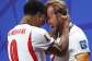 Harry Kane and Jude Bellingham celebrate after scoring the equaliser against DR Congo in the World Cup round of 32. - Richard Pelham, AFP