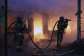 Firefighters put out a blaze at a market during the Russian missile strike on the Ukrainian capital of Kyiv -  Serhii Okunev, AFP