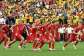 Switzerlands players race to celebrate after Ruben Vargas slots in the winning penalty against Colombia. -  Simon Fearn, Reuters