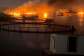 Smoke rises from a port near the Strait of Hormuz, following a U.S. strike in Kuhestak, Iran, on July 8, 2026. -  Social Media via Reuters