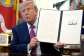 President Donald Trump holds up a signed executive order in the Oval Office of the White House on August 27, 2026. -  Manuel Balce Ceneta, AP