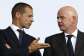 UEFA president Aleksander Ceferin speaks with FIFA president Gianni Infantino during a match at Euro 2024 in Berlin on June 29, 2024. -  Odd Andersen, AFP
