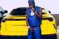 Shatta Wale posing behind his Lamborghini stolen from USA