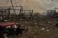 Destroyed vehicles and debris are scattered after a Russian attack in the village of Myla, outskirts of Kyiv, 30 August 2026. -  Francisco Seco, AP