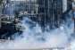 Israeli forces block a street and fire tear gas during an Israeli raid between the Kafr Aqab neighbourhood and the Qalandia refugee camp, south of the West Bank city of Ramallah, on August 25, 2026. -  Zain Jaafar, AFP