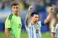 Argentinas Lionel Messi celebrates with goalkeeper Emiliano Martinez after his teams extra-time win over Cape Verde.  By ROBERTO SCHMIDT (AFP)