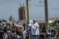 Former Senegalese president Macky Sall greets a crowd welcoming him on his arrival in Dakar.  By Patrick MEINHARDT (AFP)