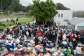 Hundreds of Zimbabweans gathered outside the Zimbabwean Consulate in Cape Town last month, seeking help to leave South Africa.  By RODGER BOSCH (AFP)