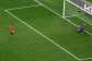 Mohamed Salah (L) stepped up third in the shootout for Egypt and scored a Panenka penalty.  By Aric Becker (AFP)