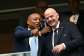 Patrice Motsepe (left) said Gianni Infantino had remained loyal to Africa.  By Paul ELLIS (AFP/File)