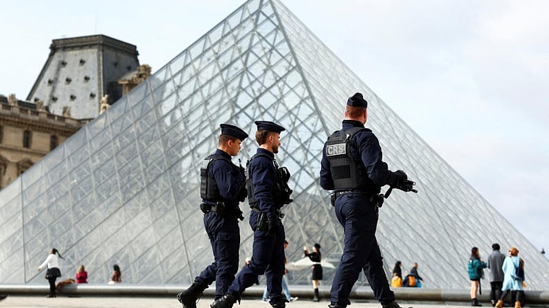Woman, 38, charged over role in plot to steal priceless gems from Louvre Museum
