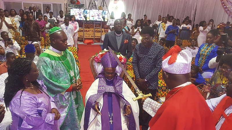 Dr. Charles C. Hackman Enthroned As Bishop In Fire City Chapel