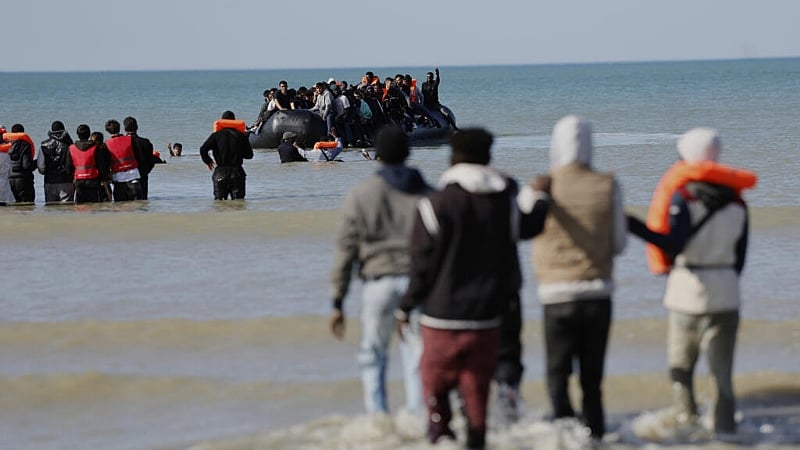 France bans 10 British 'far-right activists' over anti-migrant actions