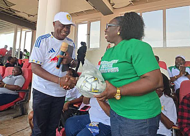 National School Sports Coordinator donates footballs to support Eastern Regi